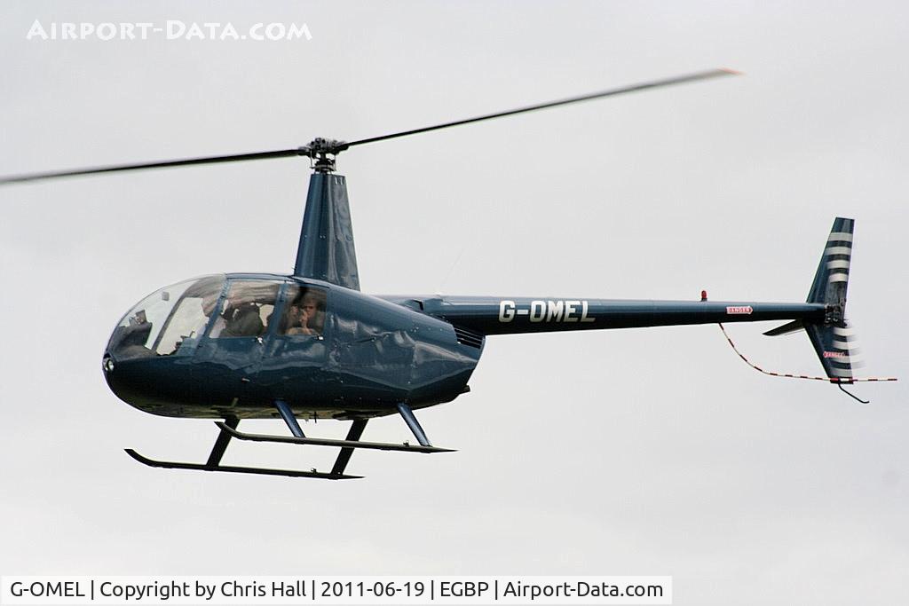 G-OMEL, 1994 Robinson R44 Astro C/N 0073, conducting pleasure flights at the Cotswold Airshow