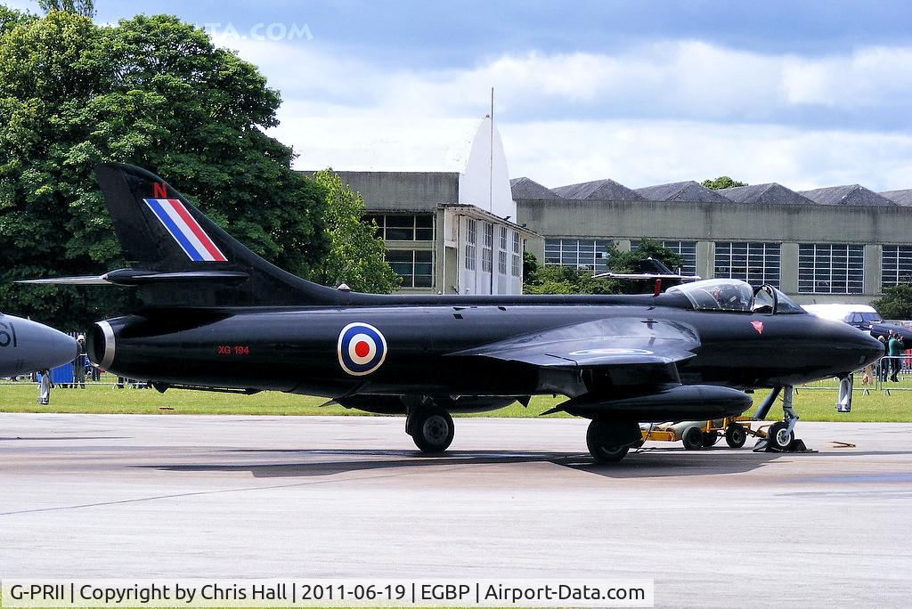 G-PRII, 1955 Hawker Hunter PR.11 C/N 41H-670690, parked on the flight line prior to its display at the Cotswold Airshow