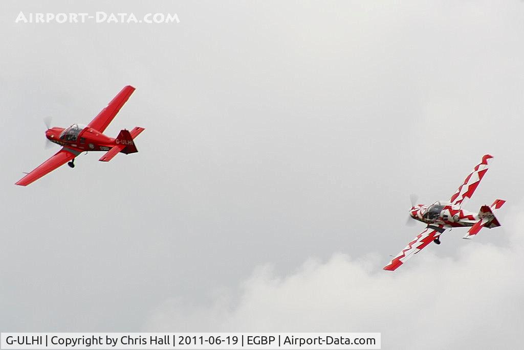 G-ULHI, 1972 Scottish Aviation Bulldog Series 100 Model 104 C/N BH100/148, Power Aerobatics Ltd Bulldog's G-ULHI & G-RNRS displaying at the Cotswold Airshow