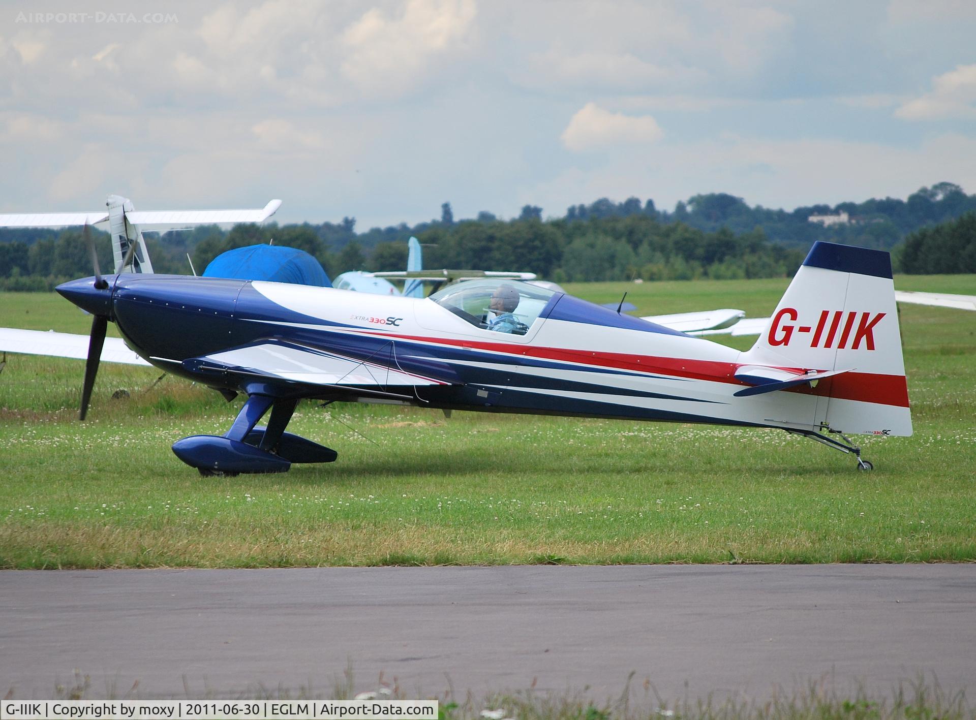 G-IIIK, 2010 Extra EA-300SC C/N SC024, Extra EA 300S/C departing for an entertaining aerobatic sortie at White Waltham.