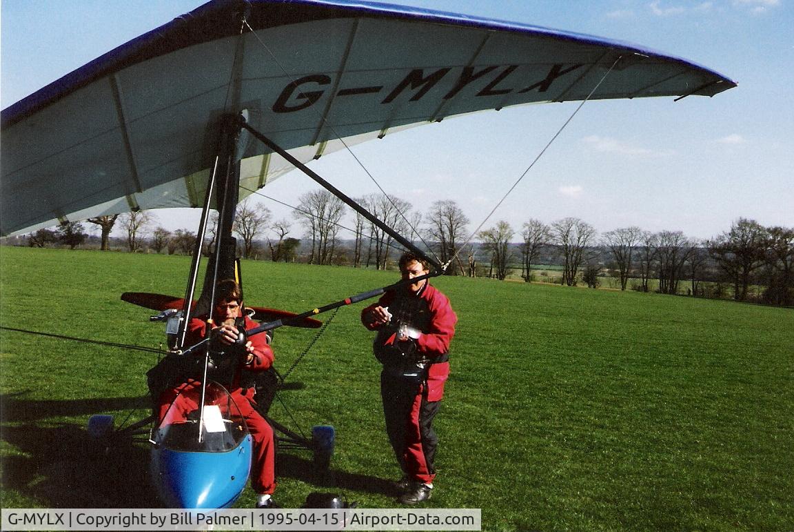 G-MYLX, 1993 Medway Raven X C/N MRB113/109, John (pilot) and passenger preparing for flight from Haxted April 1995