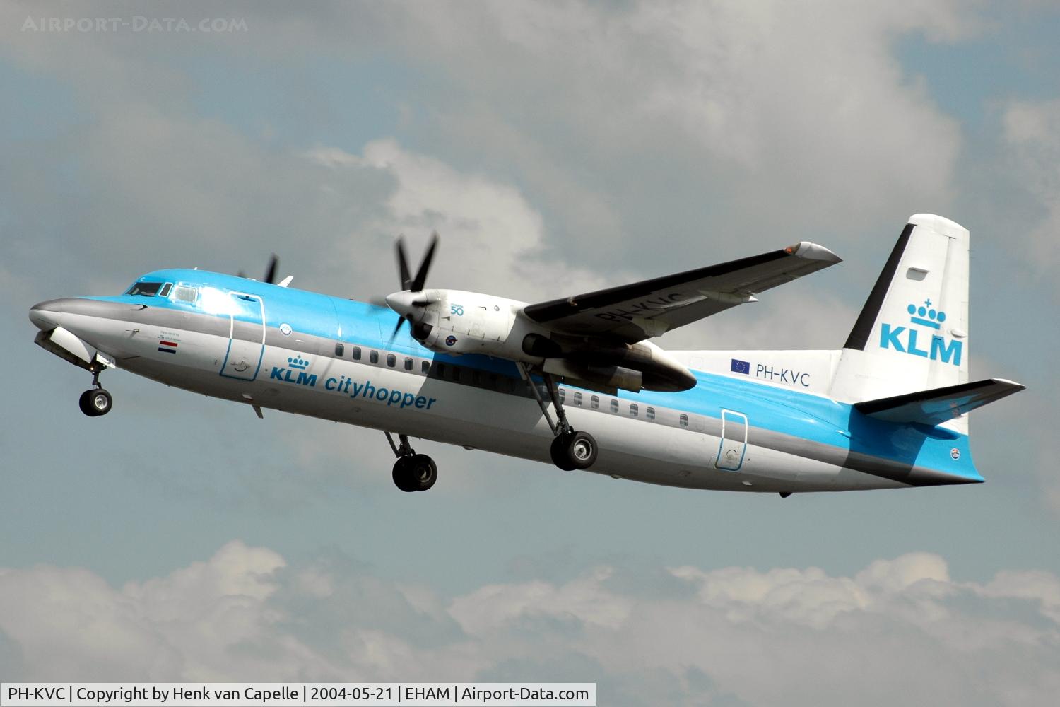 PH-KVC, 1990 Fokker 50 C/N 20191, KLM Fokker 50 retracting its landing gear after take off from Schiphol airport.