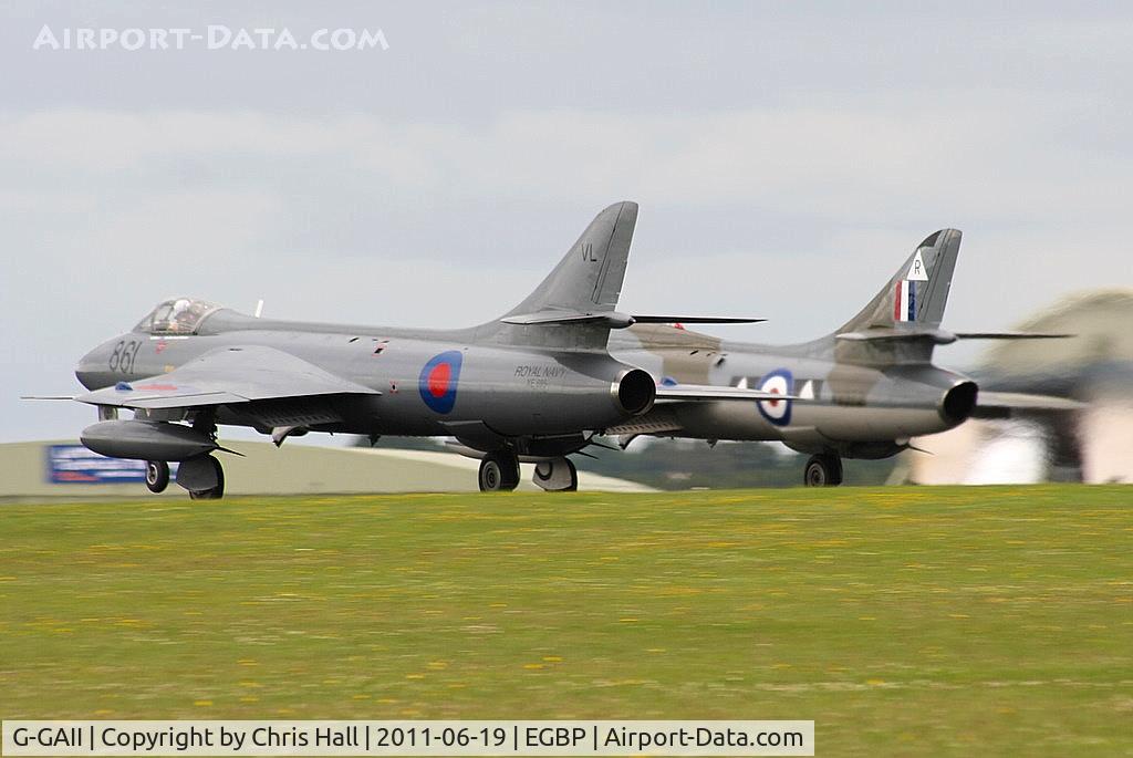 G-GAII, 1955 Hawker Hunter GA.11 C/N HABL-003028, taking off alongside G-BXFI