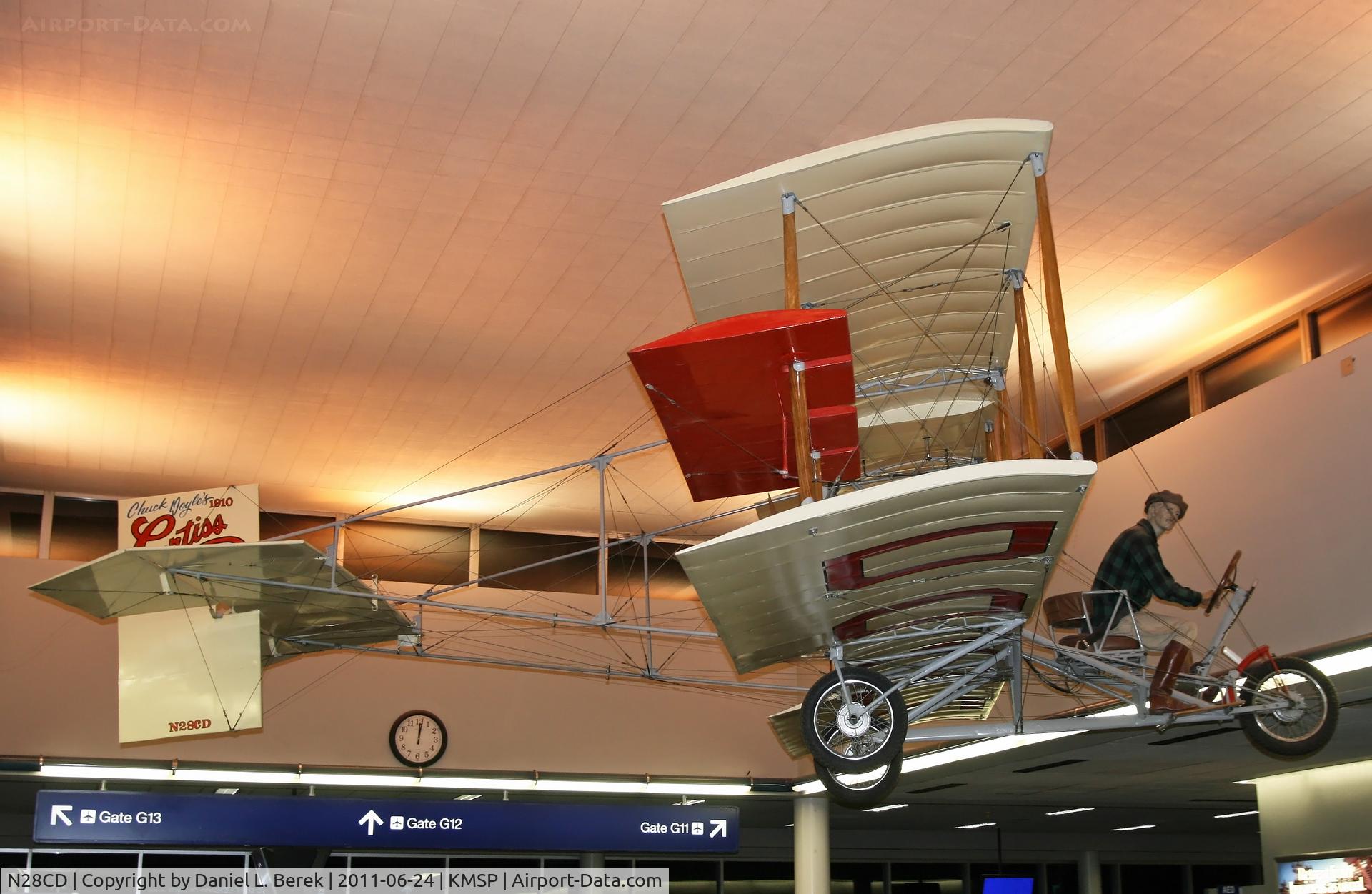N28CD, 1964 Curtiss MR 1 C/N 1, This Curtiss replica was a nice surprise upon our arrival at MSP.  Yes, the clock in the background says it's midnight.  Gotta love flight delays!