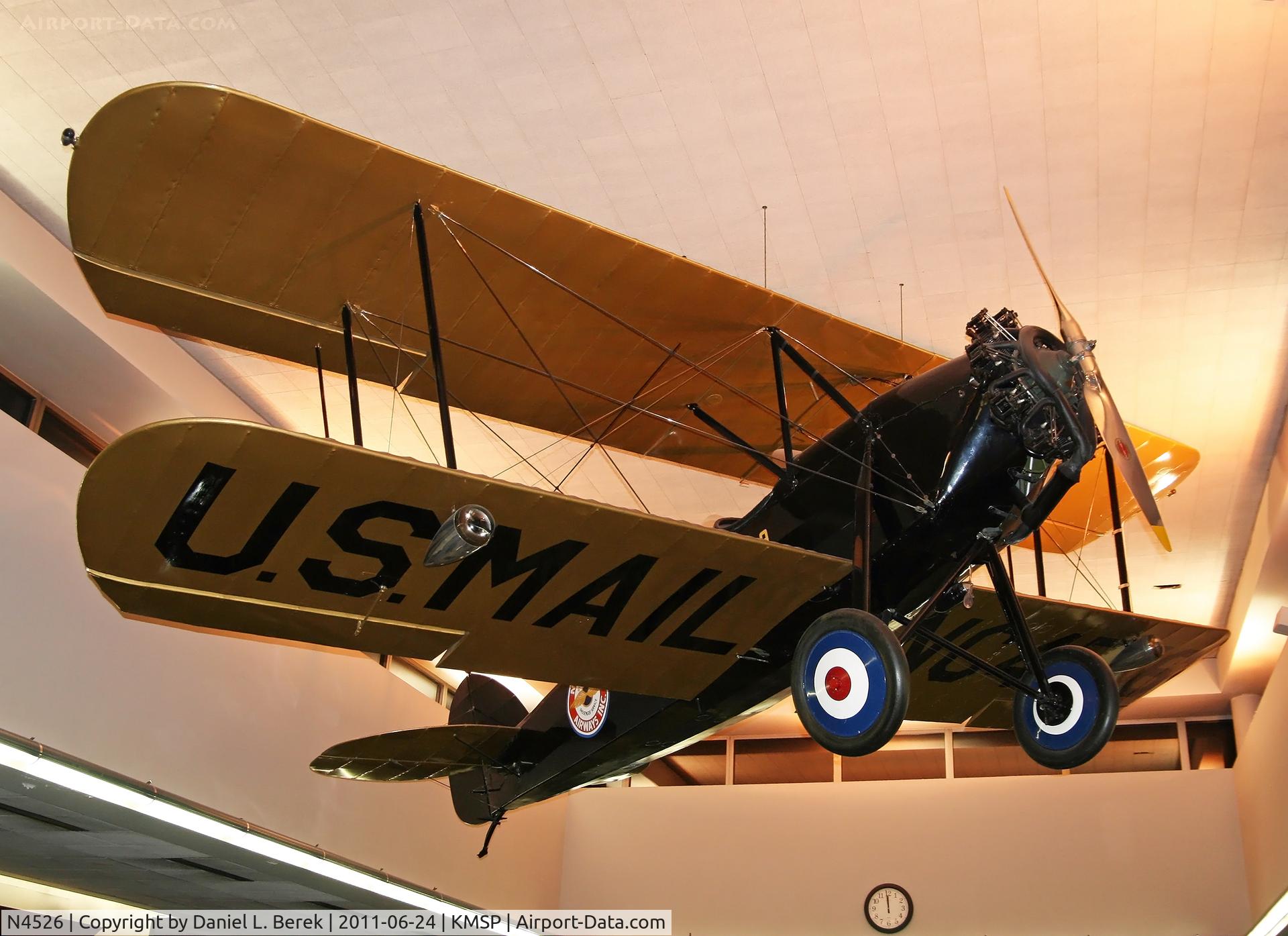N4526, 1927 Swallow Airplane Manufacturing Co B1 Mail Plane C/N 14, This aircraft has been restored to Northwest Airlines markings and is on display in Terminal 1 (Lindbergh), Concourse G, MSP Airport.