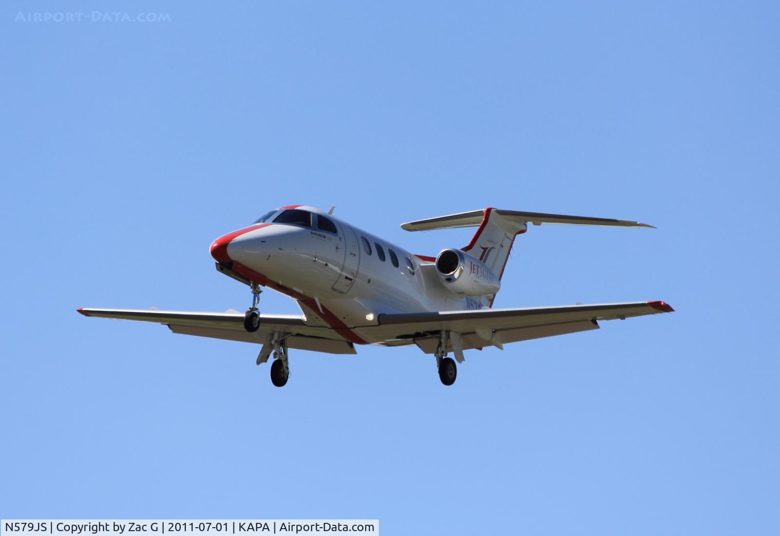 N579JS, 2009 Embraer EMB-500 Phenom 100 C/N 50000064, Landing on 17L.