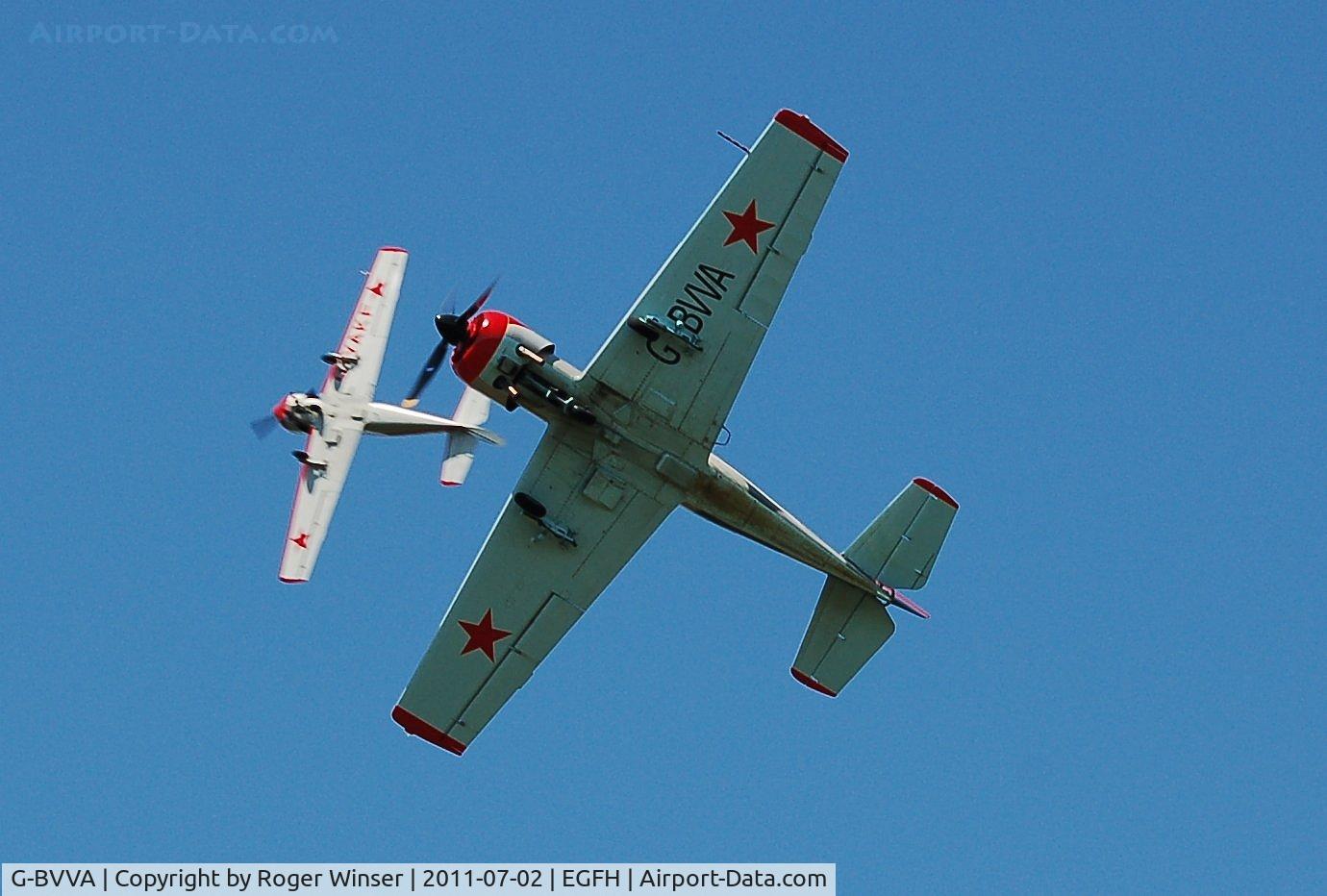 G-BVVA, 1987 Bacau Yak-52 C/N 877610, Run and break over Runway 22 by Osprey 2 after formation aerobatics practice.