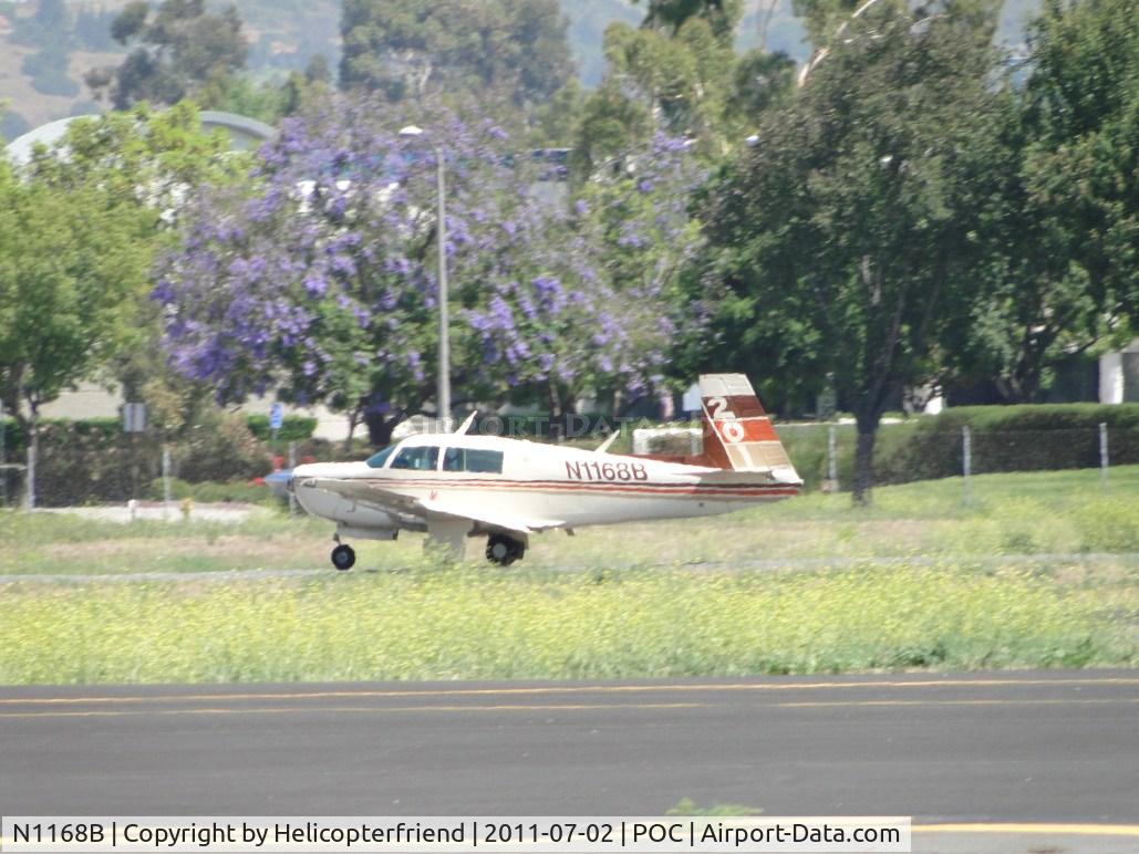 N1168B, 1982 Mooney M20J 201 C/N 24-1303, Rolling out after touchdown on runway 26R