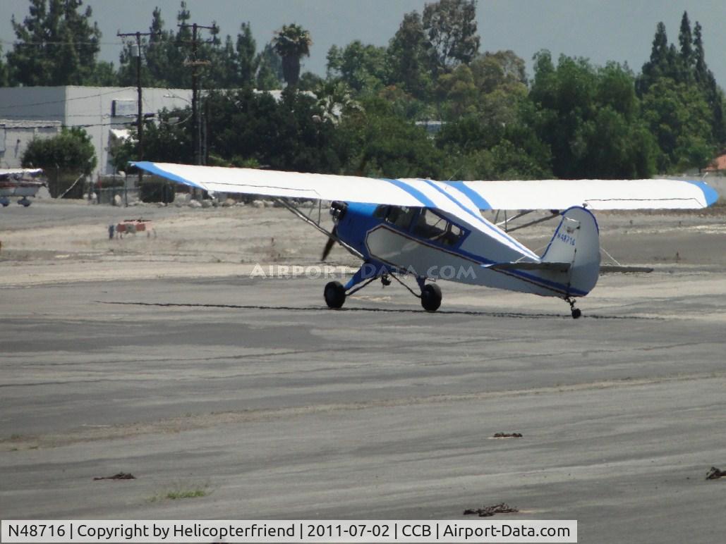 N48716, 1942 Aeronca 0-58B Grasshopper C/N 058B-6452, Taxiing back to hanger