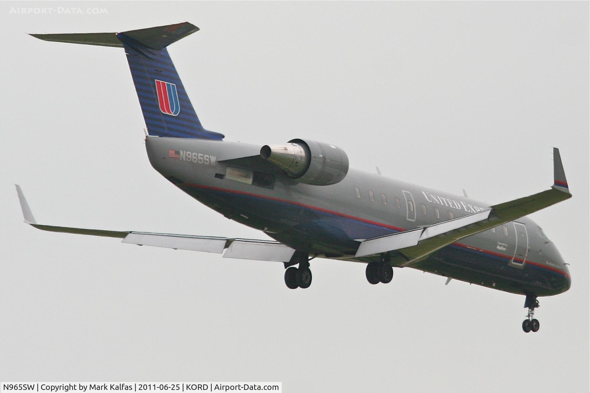 N965SW, 2003 Bombardier CRJ-200ER (CL-600-2B19) C/N 7871, SkyWest/United Express  Bombardier CL-600-2B19, SKW5540 arriving from Milwaukee / KMKE, RWY 14R approach KORD.