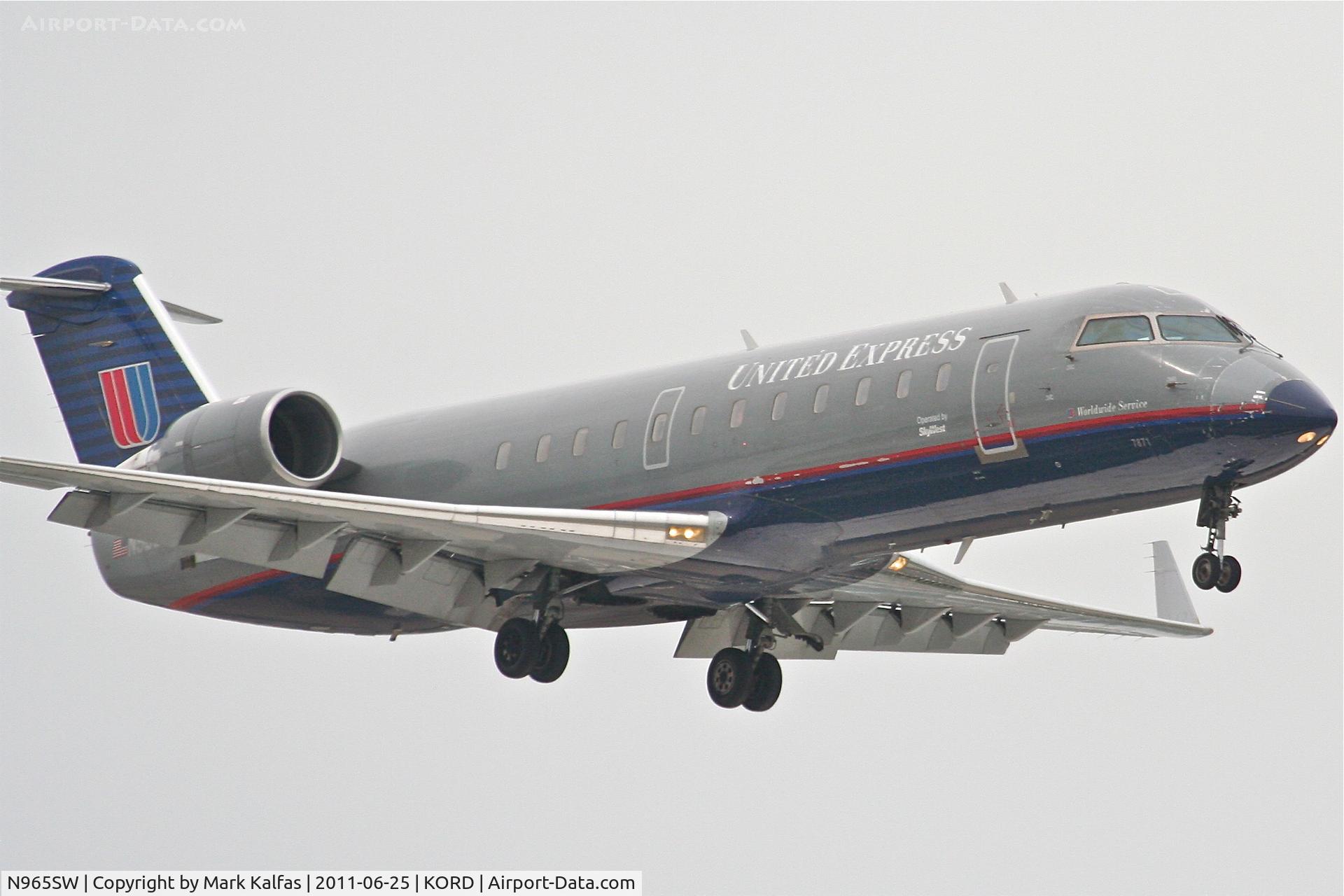 N965SW, 2003 Bombardier CRJ-200ER (CL-600-2B19) C/N 7871, SkyWest/United Express  Bombardier CL-600-2B19, SKW5540 arriving from Milwaukee / KMKE, RWY 14R approach KORD.