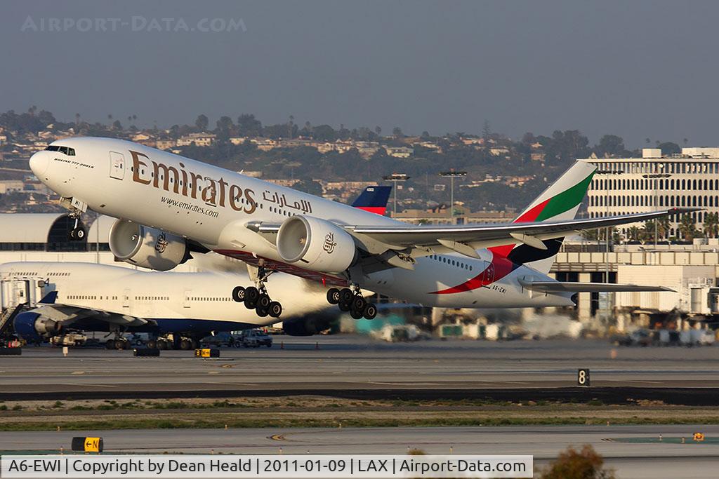 A6-EWI, 2008 Boeing 777-21H/LR C/N 35589, Emirates A6-EWI departing RWY 25R.
