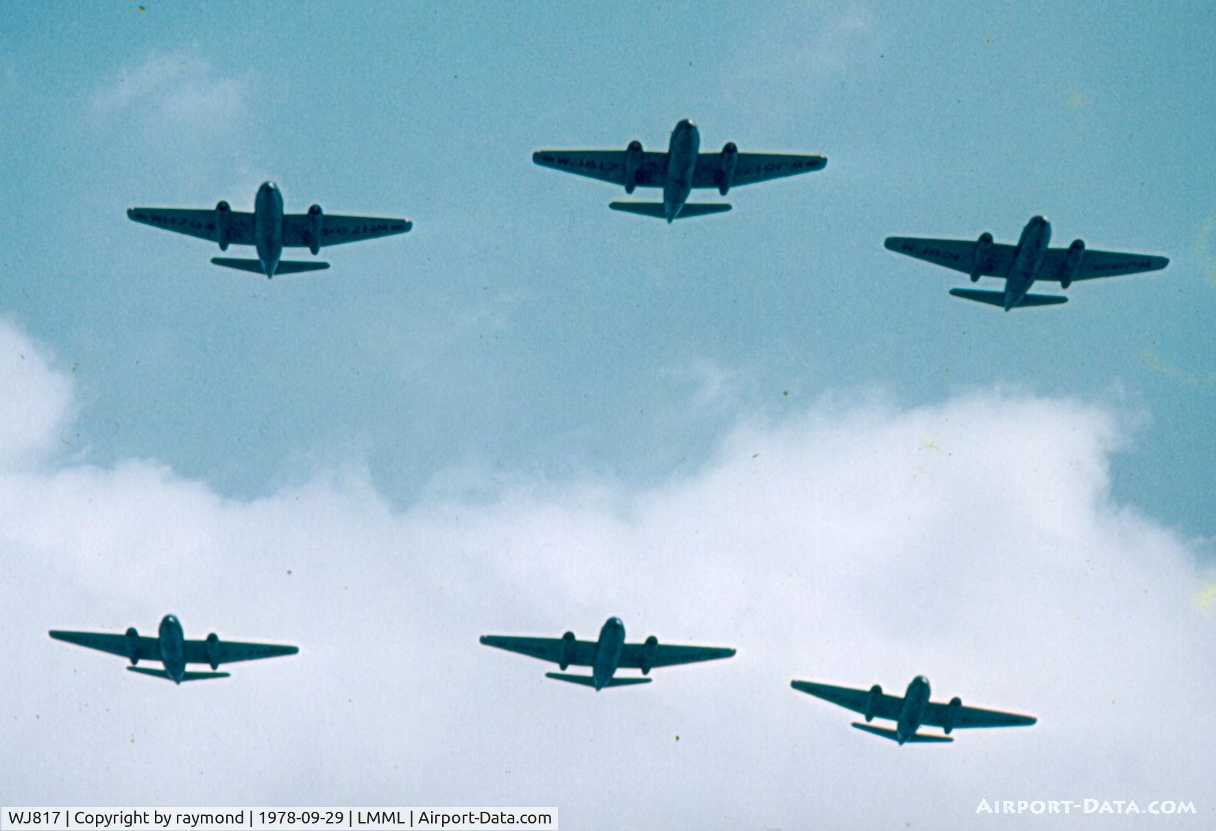 WJ817, 1954 English Electric Canberra PR.7 C/N 71075, 6 Canberras performing formation flypast over RAF Luqa Malta marking the end and withdrawal of the British Forces from Malta. No13 Sqdn RAF was based in Malta.