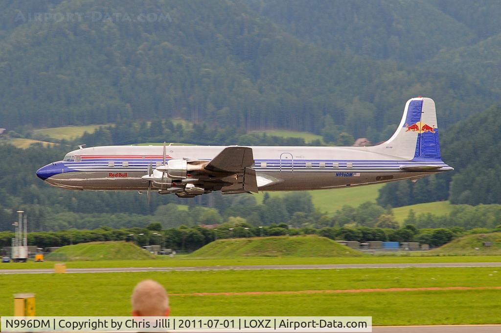 N996DM, 1958 Douglas DC-6B C/N 45563, Red Bull