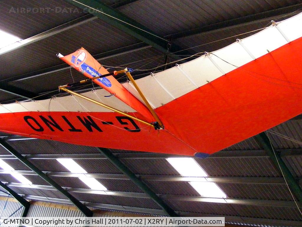 G-MTNO, 1987 Solar Wings Pegasus XL-Q C/N SW-WQ-0001, hanging from the hangar roof at Rayne Hall Farm