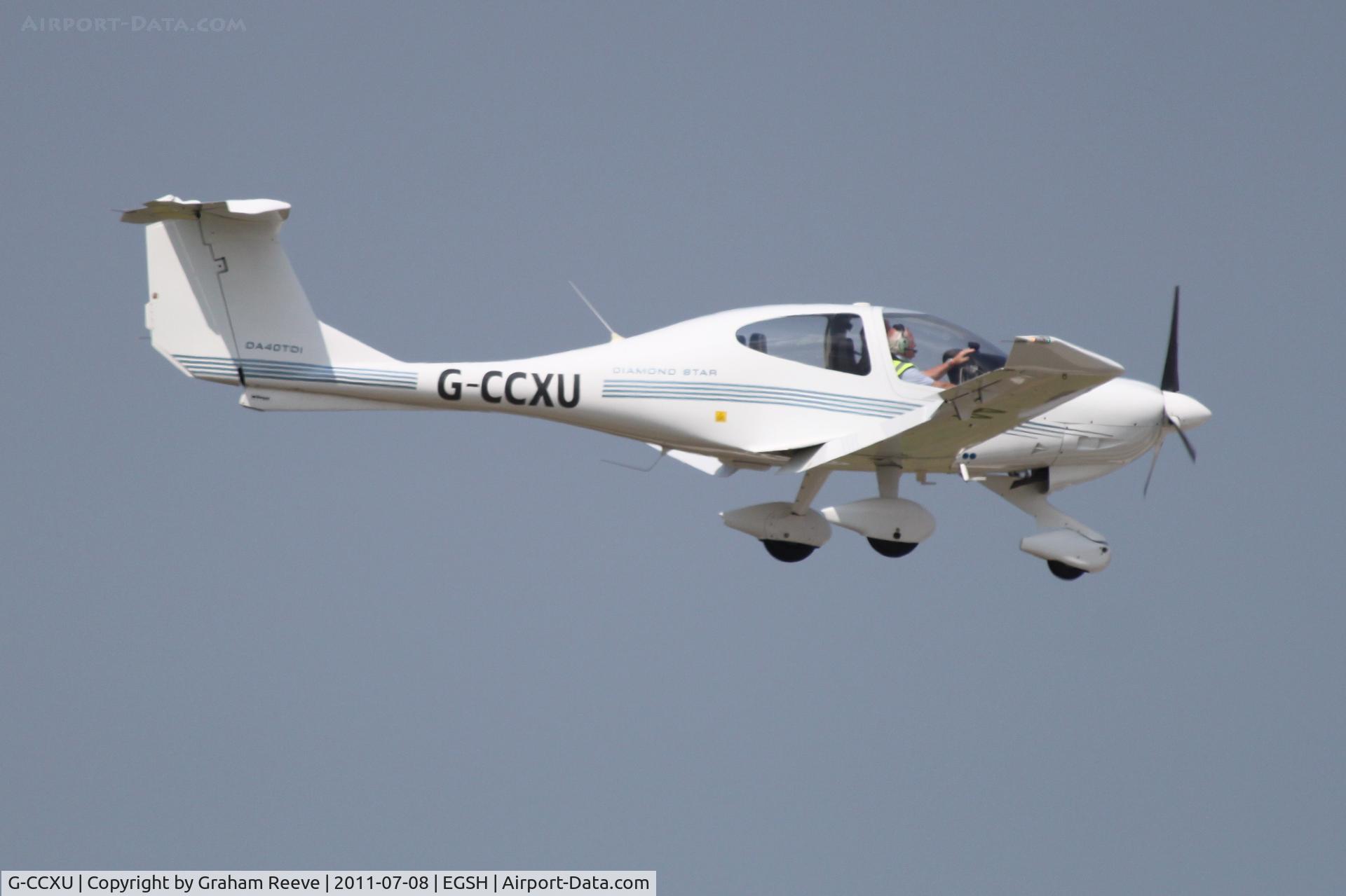 G-CCXU, 2003 Diamond DA-40D Diamond Star C/N D4.037, Landing at Norwich.
