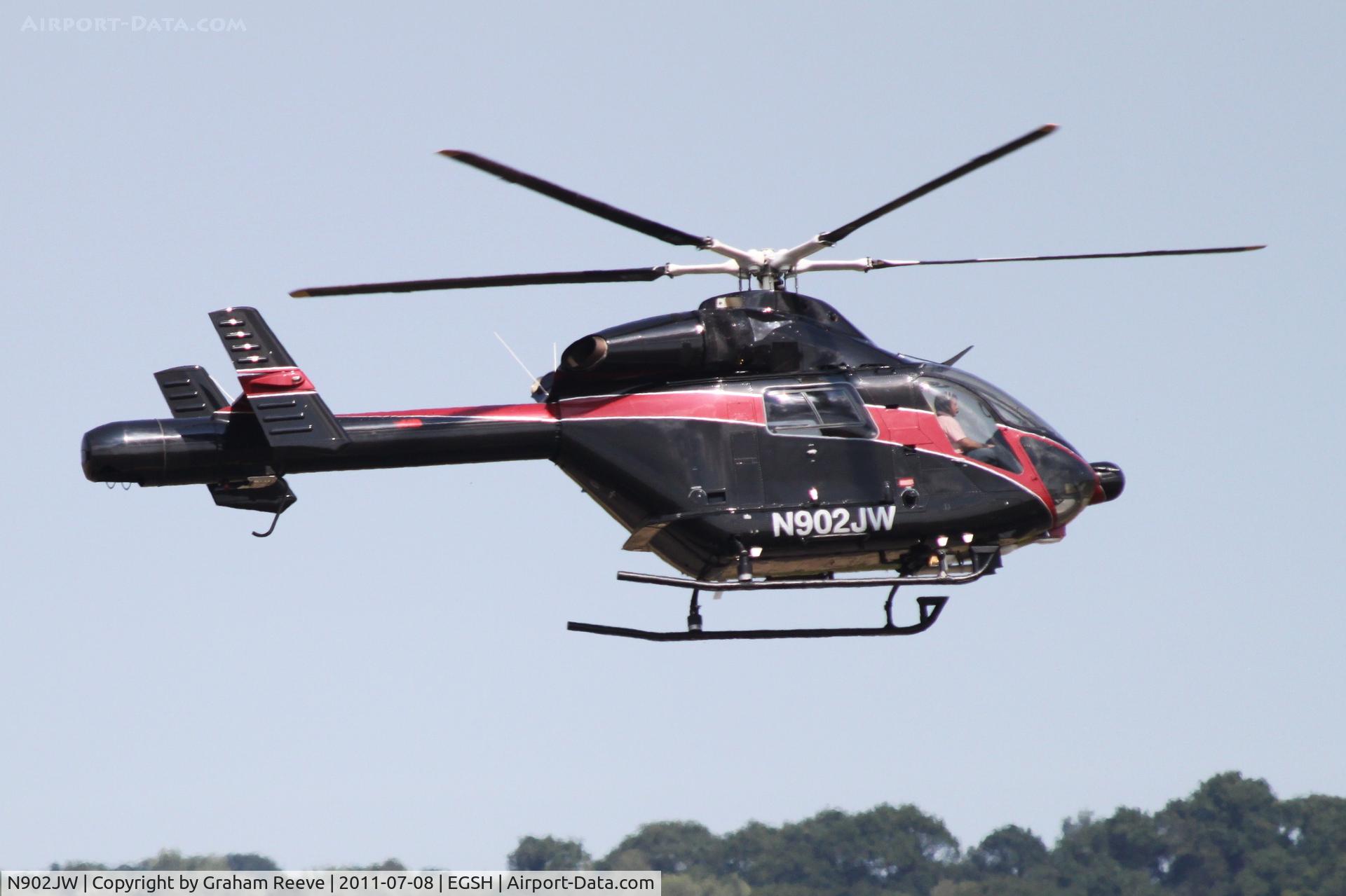N902JW, 2001 MD Helicopters MD-900 Explorer C/N 900-00086, About to touch down.