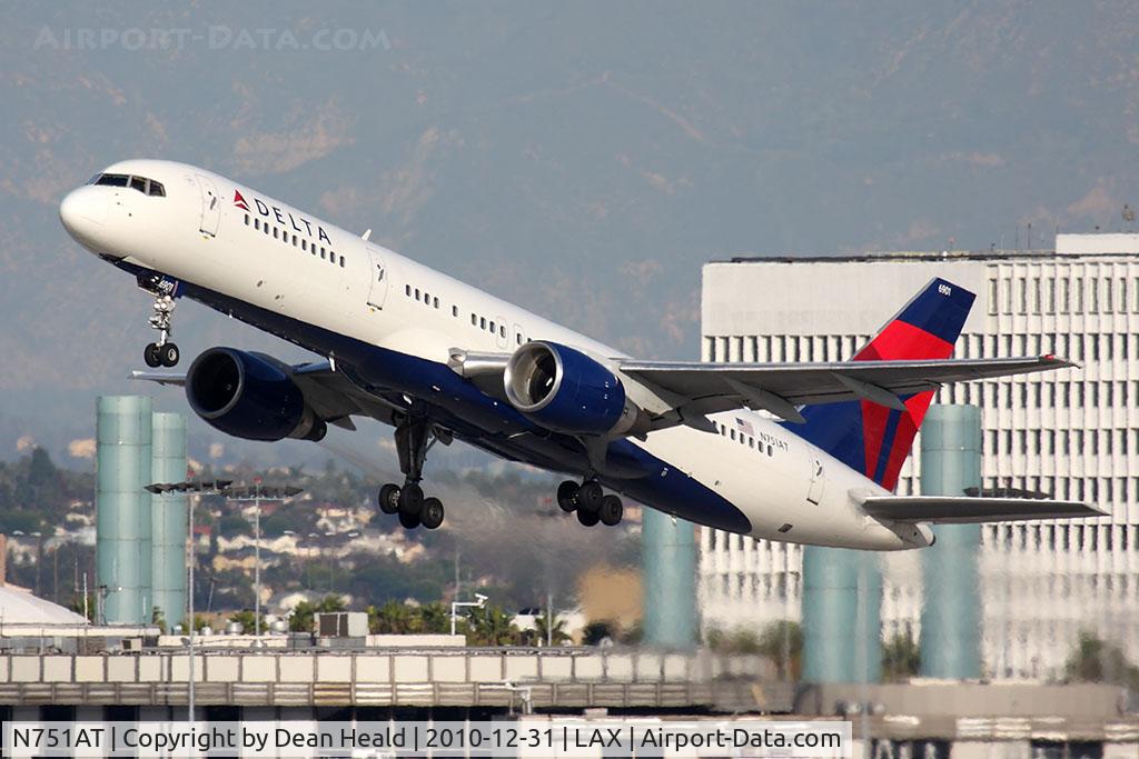 N751AT, 1984 Boeing 757-212 C/N 23125, Delta Air Lines N751AT (FLT DAL1299) climbing out from RWY 25R en route to Kona Int'l (KOA/PHKO).  It's hard to believe that this airplane is over 26 years old at the time of this photo.