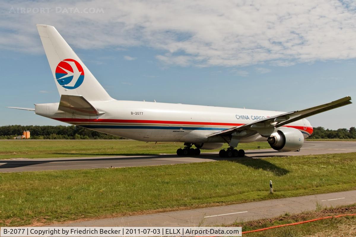 B-2077, 2010 Boeing 777-F6N C/N 37713, holding point RW06