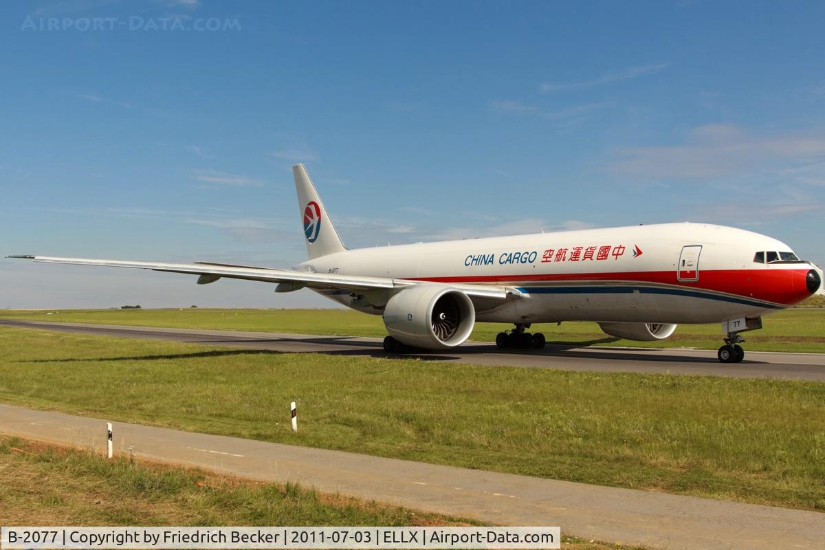B-2077, 2010 Boeing 777-F6N C/N 37713, taxying to the active