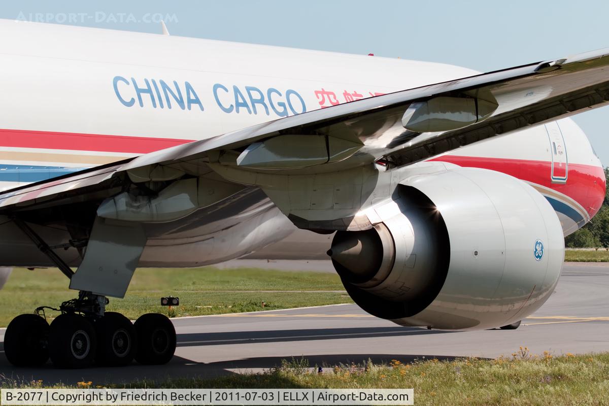 B-2077, 2010 Boeing 777-F6N C/N 37713, holding point RW06
