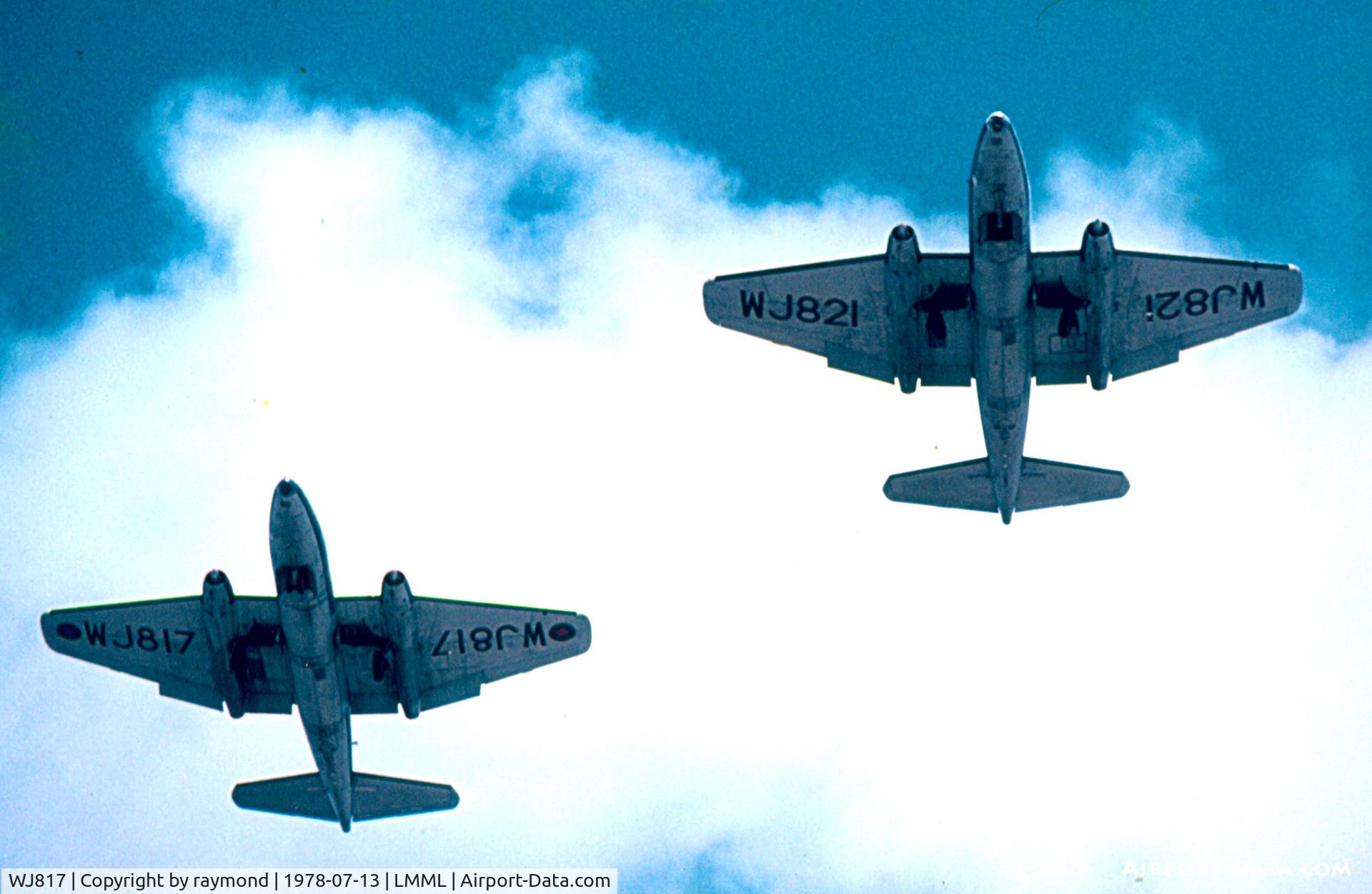 WJ817, 1954 English Electric Canberra PR.7 C/N 71075, A pair of Canberra PR7s WJ817 and WJ821 performing a slow flypast over RAF Luqa Airfield, home base of 13Squadron, where they besed till March 1979. Eventually the British Forces withdrawn their airbase facilities from Malta.