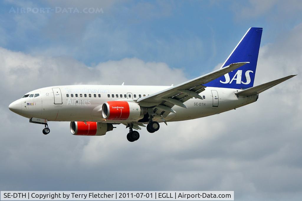 SE-DTH, 1999 Boeing 737-683 C/N 28313, SAS Boeing 737-683, c/n: 28313 at Heathrow
