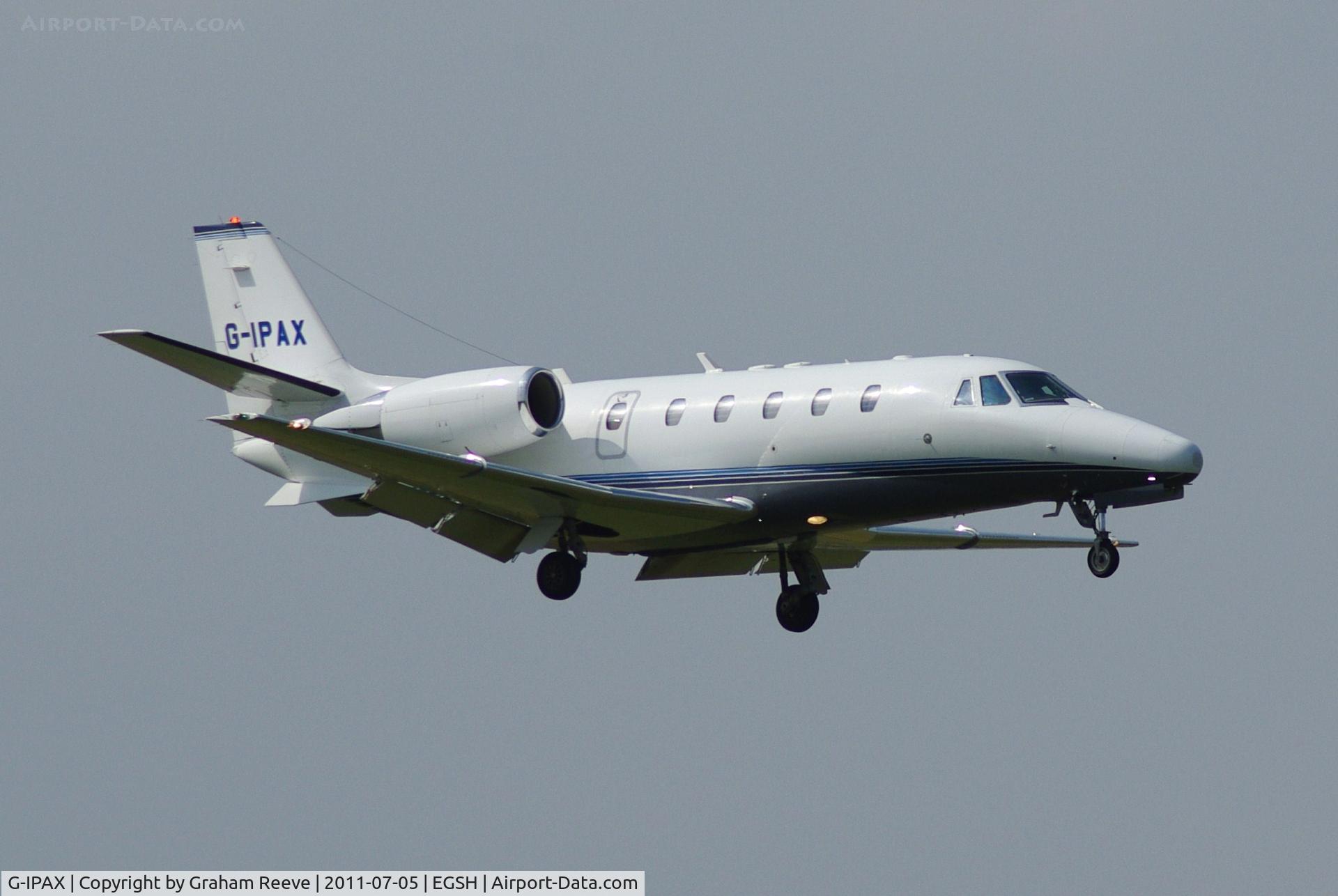 G-IPAX, 2002 Cessna 560XL Citation Excel C/N 560-5228, About to land.