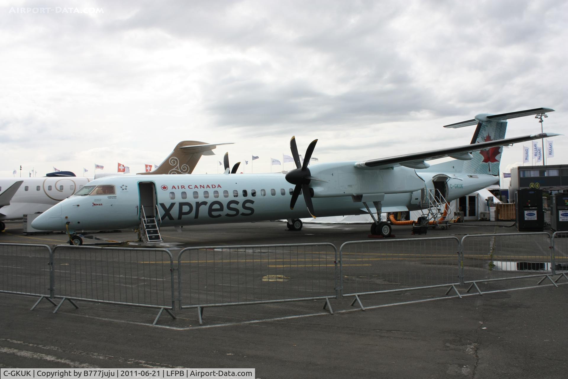C-GKUK, 2011 De Havilland Canada DHC-8-402Q Dash 8 C/N 4369, on display at SIAE 2011
