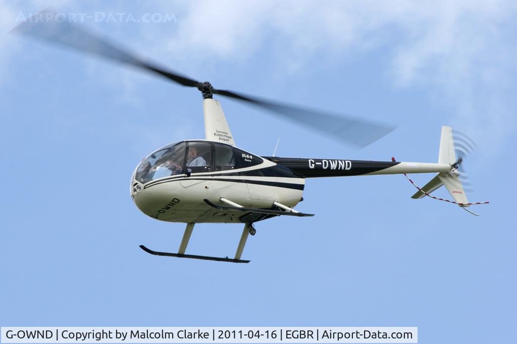 G-OWND, 1999 Robinson R44 Astro C/N 0644, Robinson R44 Astro at Breighton Airfield in April 2011.