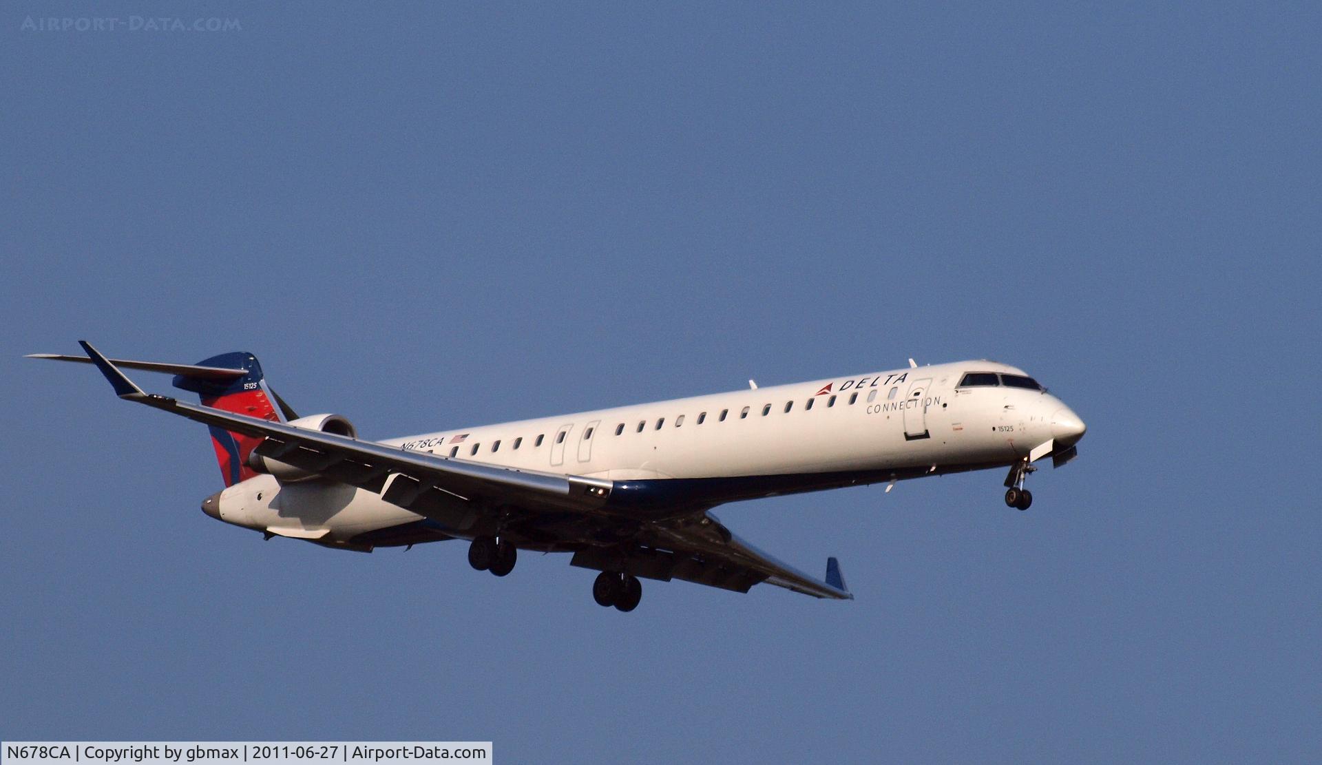N678CA, 2007 Bombardier CRJ-900ER (CL-600-2D24) C/N 15125, Going to a landing at JFK