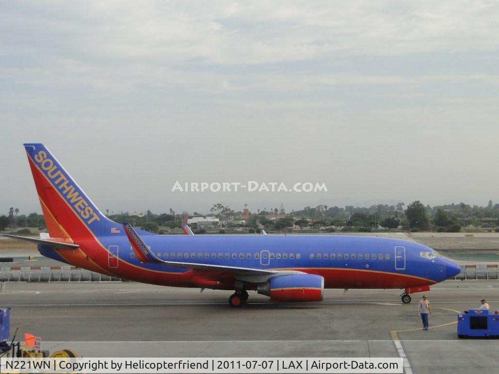 N221WN, 2005 Boeing 737-7H4 C/N 34259, Just having been pushed back from Gate 14 and starting up the engines