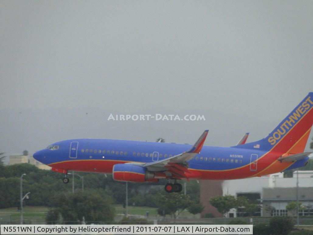 N551WN, 2001 Boeing 737-76Q C/N 30280, Over the numbers on runway 24R