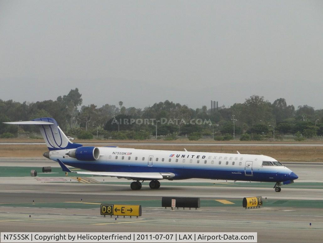 N755SK, 2005 Bombardier CRJ-700 (CL-600-2C10) Regional Jet C/N 10220, Waiting for their turn for take off on runway 24L