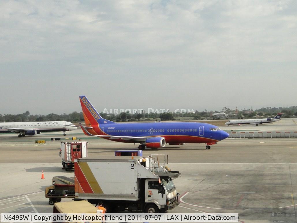 N649SW, 1997 Boeing 737-3H4 C/N 27719, Taxiing to terminal