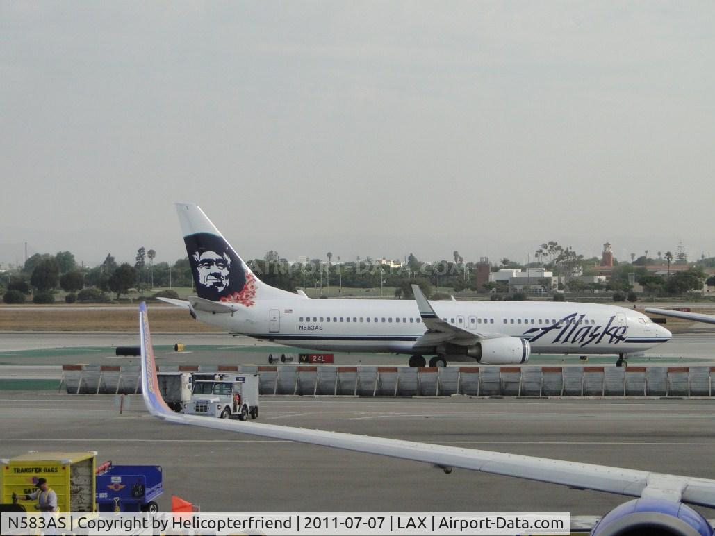 N583AS, 2007 Boeing 737-890 C/N 35681, Taxiing onto runway 24L for take off