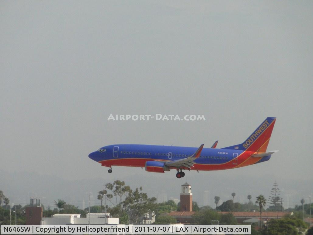 N646SW, 1997 Boeing 737-3H4 C/N 28331, On final for landing on runway 24R