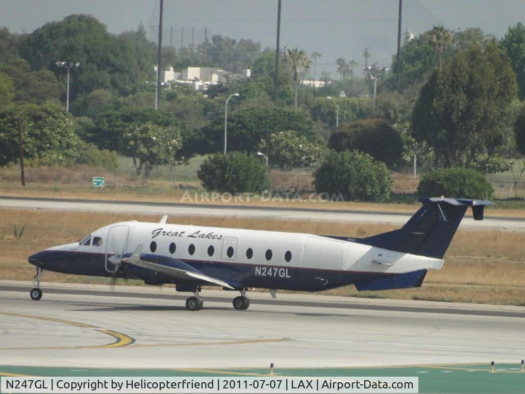 N247GL, 1996 Beech 1900D C/N UE-247, Starting westerly roll for take off on runway 24L