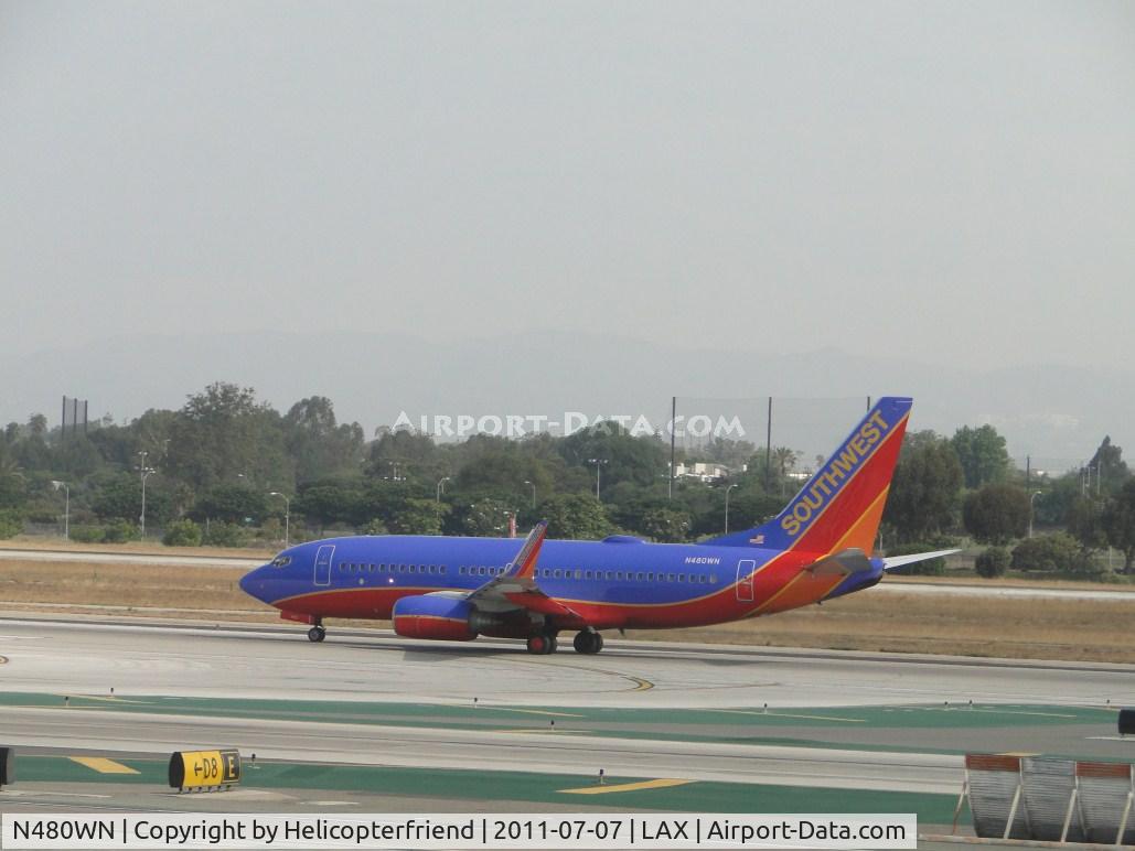 N480WN, 2004 Boeing 737-7H4 C/N 33998, Starting take off roll on runway 24L