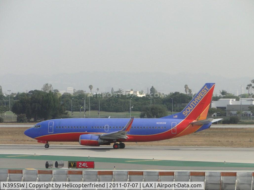 N395SW, 1994 Boeing 737-3H4 C/N 27689, Starting take off roll on runway 24L