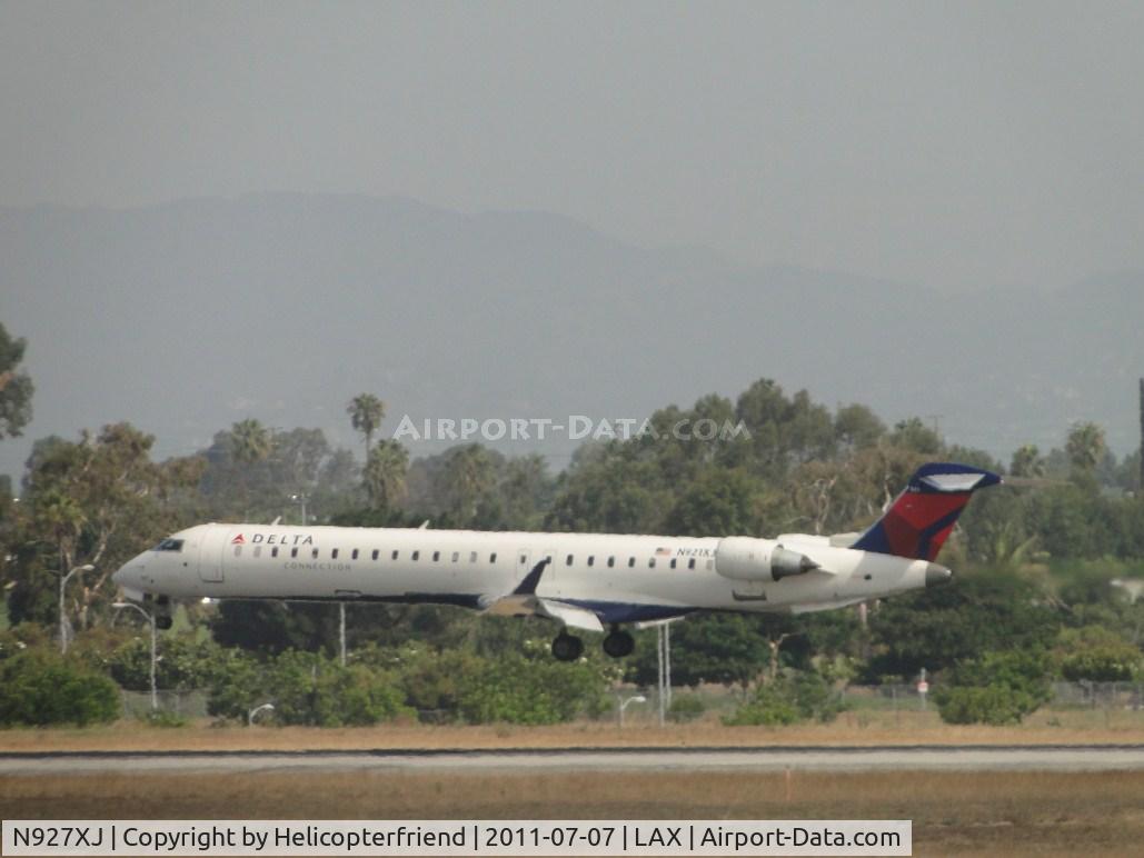 N927XJ, 2008 Bombardier CRJ-900ER (CL-600-2D24) C/N 15188, Landing on runway 24R
