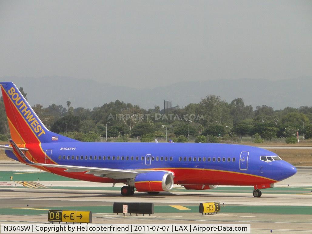 N364SW, 1993 Boeing 737-3H4 C/N 26575, Taxiing to runway 24L for take off
