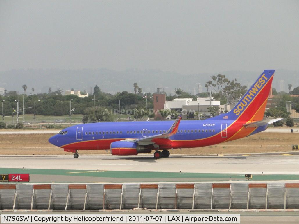 N796SW, 2001 Boeing 737-7H4 C/N 27889, Starting take off roll westbound on runway 24L