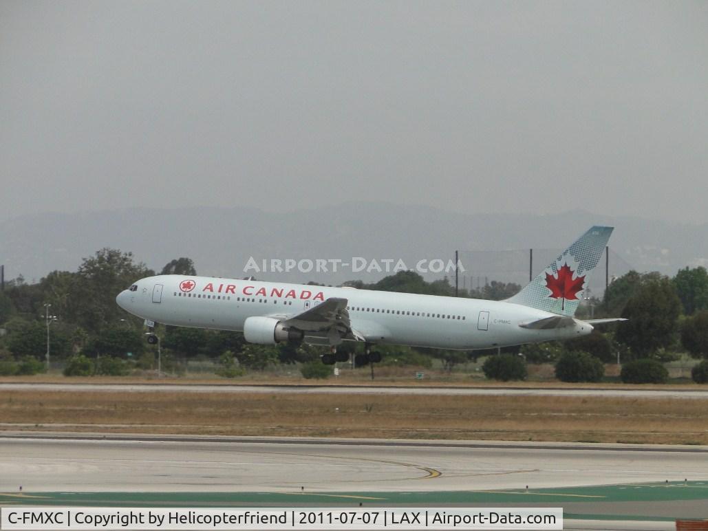 C-FMXC, 1996 Boeing 767-333/ER C/N 25588, Landing on runway 24R
