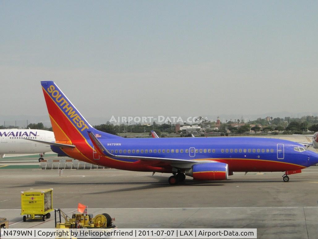 N479WN, 2004 Boeing 737-7H4 C/N 33990, Taxiing to assigned terminal