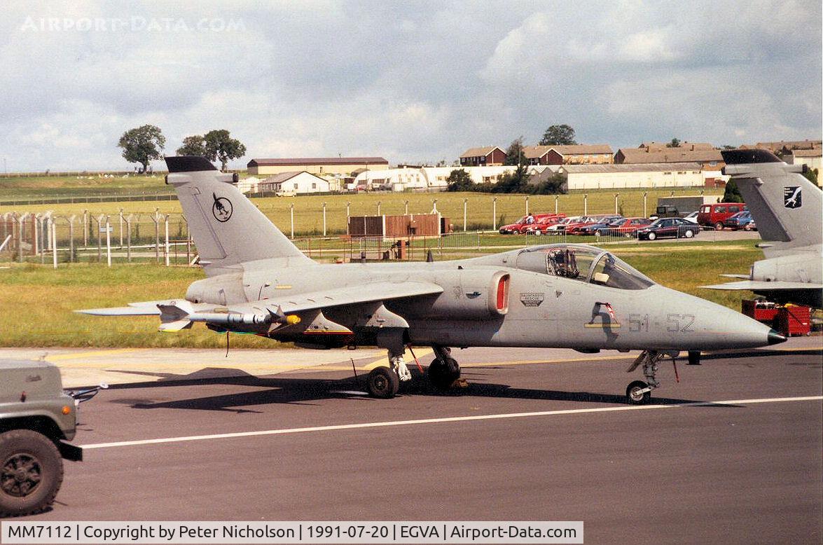 MM7112, 1990 AMX International AMX C/N IX024, AMX, callsign India 7092, of the Italian Air Force's 51 Stormo on the flight-line at the 1991 Intnl Air Tattoo at RAF Fairford.