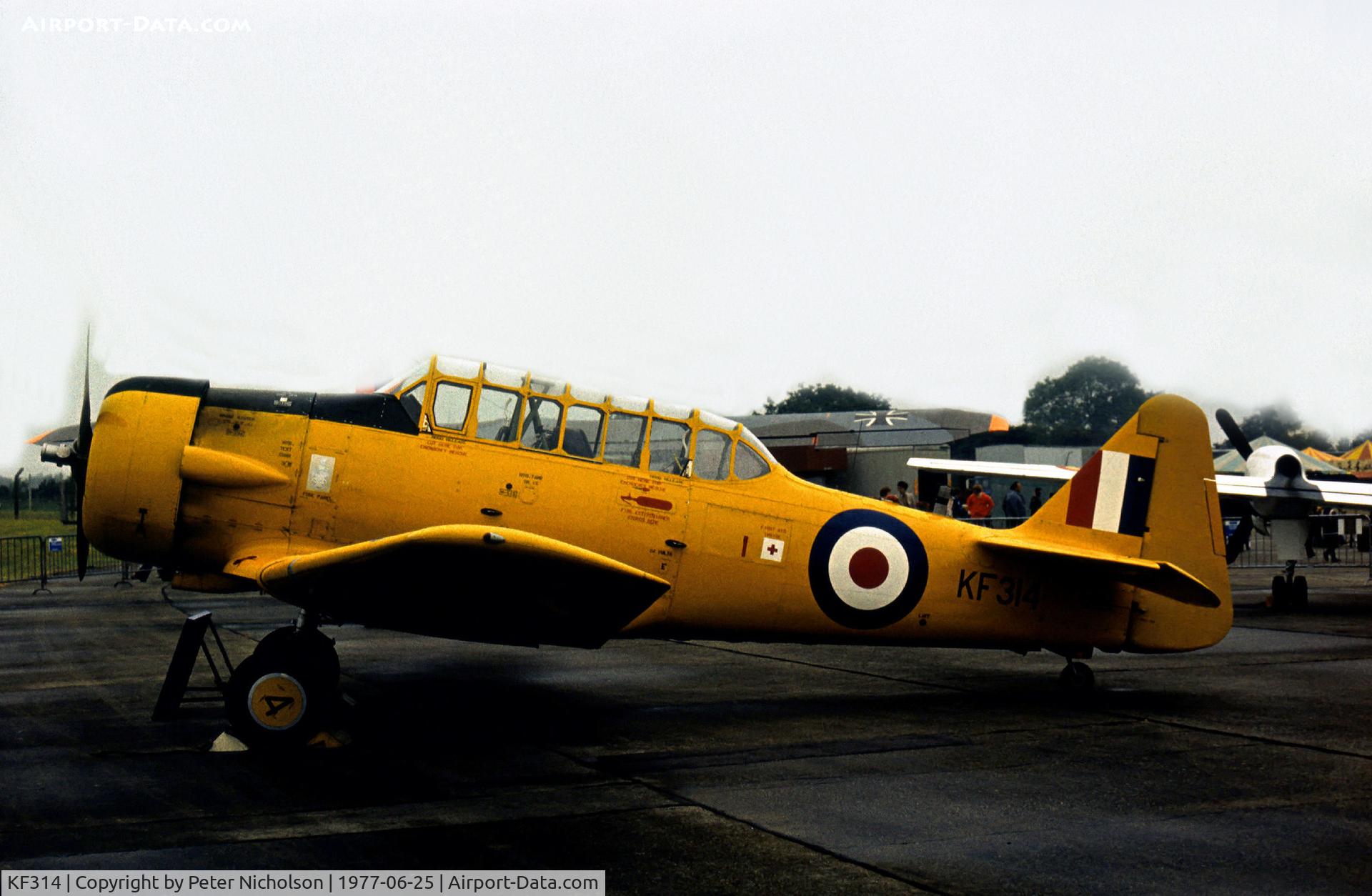 KF314, Noorduyn AT-16 Harvard IIB C/N 14A-2014, Harvard T.2B of the Aeroplane & Armament Experimental Establishment (A&AEE) at Boscombe Down on display at the 1977 Intnl Air Tattoo at RAF Greenham Common.