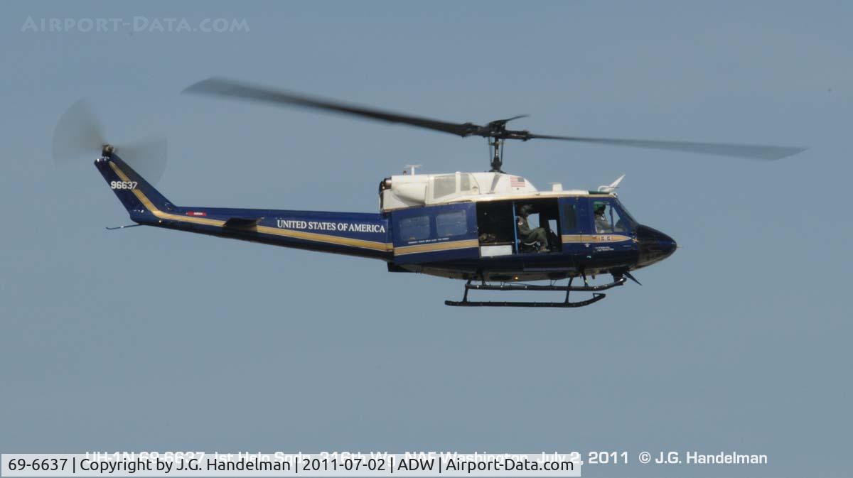 69-6637, Bell UH-1N Iroquois C/N 31043, over NAF Washington flight line