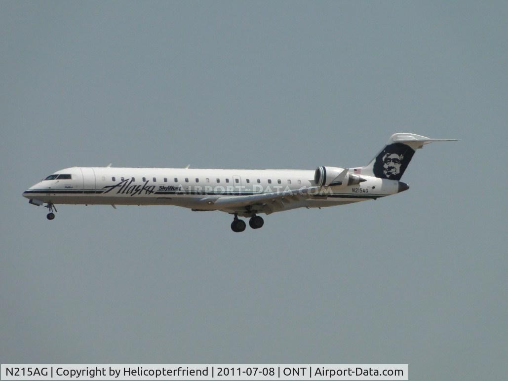 N215AG, 2000 Bombardier CRJ-701 (CL-600-2C10) Regional Jet C/N 10009, On final to runway 26R