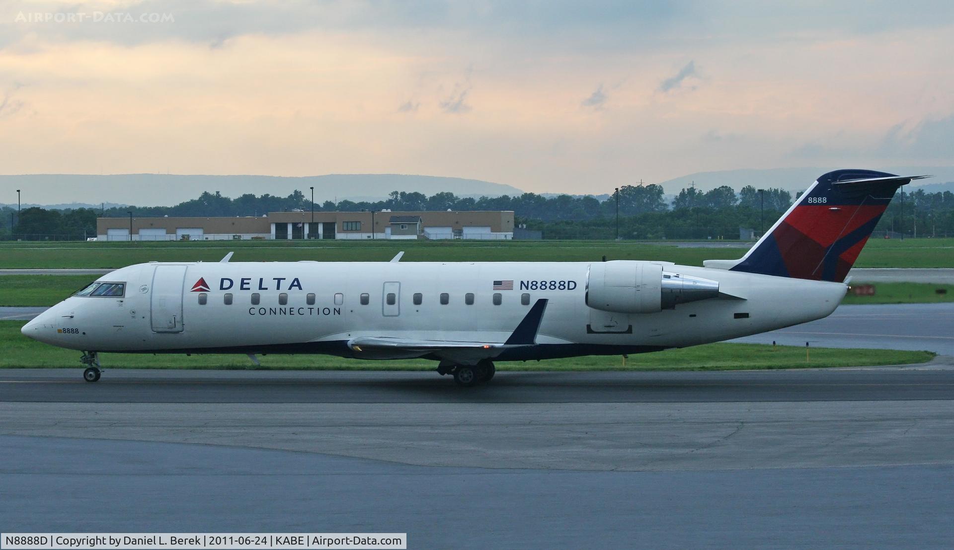 N8888D, 2003 Bombardier CRJ-200 (CL-600-2B19) C/N 7888, This Delta Connection (Pinacle Airlines) CRJ patiently awaits a free gate at Lehigh Valley International Airport.  This aicraft would eventually take me on the first leg of my journey to Minneapolis on a flight to Detroit.